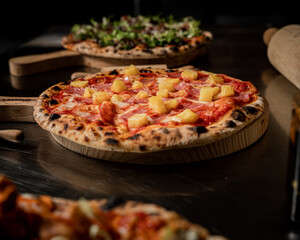 handmade hawaiian pizza with fresh ingredients right out of the oven - obrazy, fototapety, plakaty