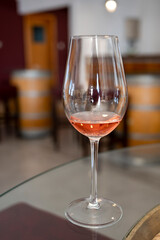 Wine industry of Cyprus island, tasting of rose dry wine on winery located on south slopes of Troodos mountain range.