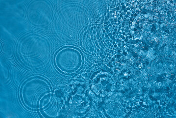Shining blue water ripple background. Summer concept.