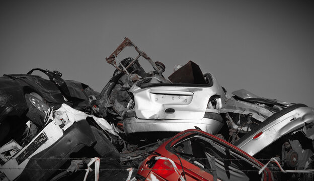 scrapped cars on a big pile, old smashed cars, warehouse or scrap collection