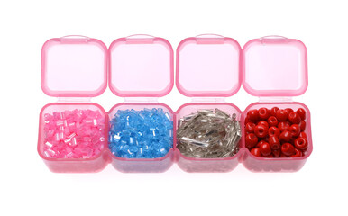 Plastic organizer with different beads isolated on white, above view