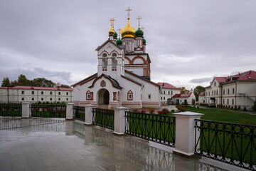 Cathedral of St. Sergius of Radonezh in the Trinity-Sergius Varnitsky Monastery on a cloudy rainy...