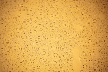 water drops on brown background.