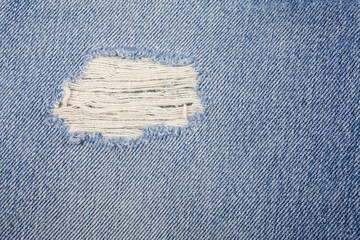 Blue torn denim jeans texture. - 484309109