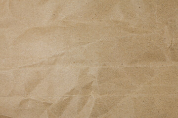 Old torn crumpled paper bag texture background.