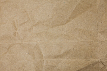 Old torn crumpled paper bag texture background.