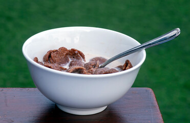 Coco Crunch with fresh milk in white cup