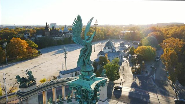 The archangel Gabriel atop its column in Heroes' Square
