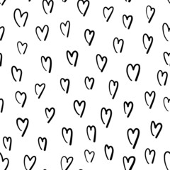 hand-drawn doodle seamless pattern with hearts. Hand-drawn Abstract vector background. Black and white.