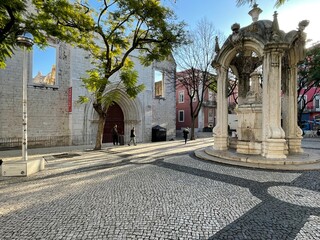 Fototapeta premium Alfama Lisboa district with square and fountain. Lisbon, Portugal