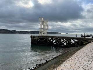 Tago River and touristic ferry boat pier in Lisboa, Lisbon, Portugal