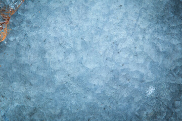 Closeup of a real blue rusted steel metal background texture. 
