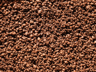 Medium-sized LECA (lightweight expanded clay aggregates) that is used to grow plants without soil. 