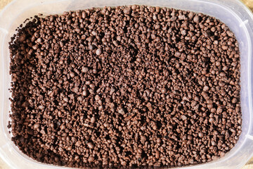 Medium-sized LECA (lightweight expanded clay aggregates) that is used to grow plants without soil. 