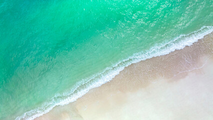 Fototapeta na wymiar Aerial view of the tropical wave water seashore sand beach beackground-Summer pattern image