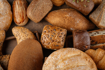Closeup on assorted variety of fresh baked loaves of bread