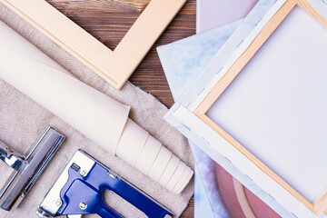 Printing on canvas of photographs, canvas stretched on a wooden stretcher. Canvas stretching tool,...