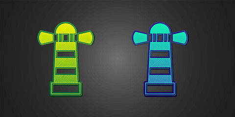 Green and blue Lighthouse icon isolated on black background. Vector