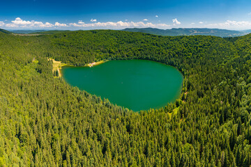 Aerial view during the summer over the volcanic Lake Saint Ana (Lacul Sfanta Ana) from...