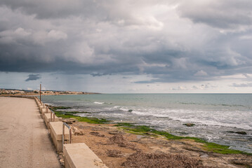 Fototapeta na wymiar Panorama of Mediterranean Sea from Donnalucata Promenade, Scicli, Ragusa, Sicily, Italy, Europe