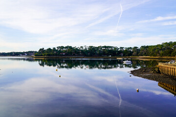 Hossegor lake with blue reflection calm water in landes southwest france