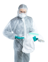 Fototapeta premium a man in a white suit, mask and glasses, holds a protective kit, the doctor looks at us and offers to wear styly clothes. virologist specialist. individual protection of a person. isolated