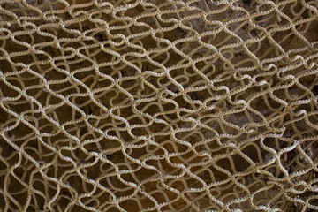 evocative image of fishermen net texture 

