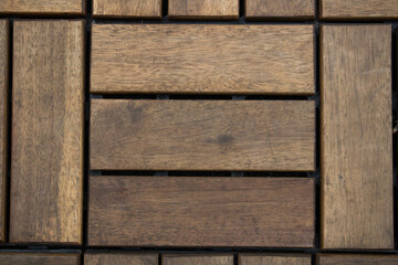 evocative texture image of square shaped wooden dowels for flooring 
