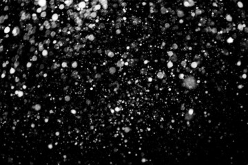 Falling snow background. Defocused. Winter Magic
