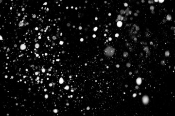 Falling snow background. Defocused. Winter Magic
