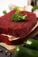 Concept of tasty food with raw beef steaks, close up