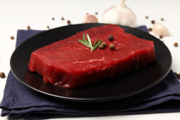 Concept of tasty food with raw beef steak, close up