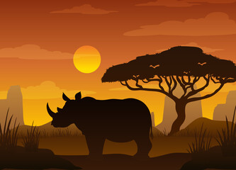 Obraz premium Rhinoceros silhouette at savanna forest