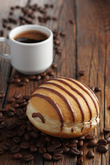 Donut with chocolate and coffee