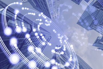 Creative circular light on blurry city background. Techonolgy, innovation and future concept. Double exposure.