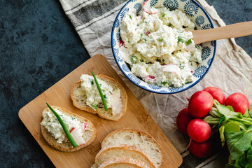 Cottage cheese with chives and radish. Light nutritious breakfast
