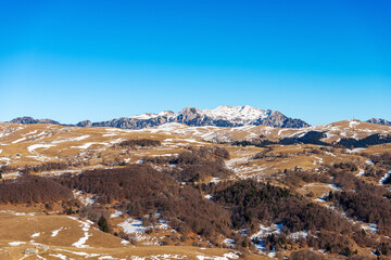 Lessinia High Plateau Regional Natural Park (Altopiano della Lessinia) and mountain range of the Monte Carega (small Dolomites), winter landscape, Erbezzo, Verona province, Veneto, Italy, Europe.