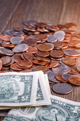 Pile of Golden coin, silver coin, copper coin, quarters, nickels, dimes, pennies, fifty cent piece and dollar coins. Various USA coins, American coins for business, money, financial coins and economy
