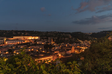 Fototapeta na wymiar View of Modica City Centre at Night, Ragusa, Sicily, Italy, Europe