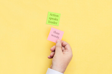 Sticky notes with an inscription Action speaks louder than words