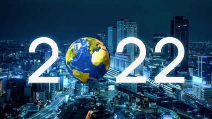 2022 New Year concept. Modern city nigh view and global network.