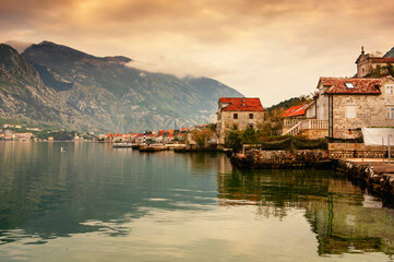Evening landscape with houses and mountains in Kotor Bay, Montenegro