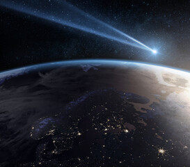 Comet, asteroid, meteorite flying to the planet Earth.  Glowing asteroid and tail of a falling comet threatening the safety of the Earth.  Elements of this image furnished by NASA.