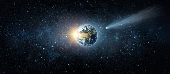 Comet, asteroid, meteorite flying to the planet Earth.  Glowing asteroid and tail of a falling comet threatening the safety of the Earth.  Elements of this image furnished by NASA. © Tryfonov