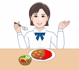 食事をする若い女性