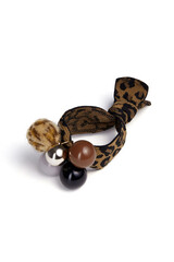 Subject shot of a scrunchie with multicolored charms and a leopard design. The rubber band with beads is isolated on the white background. Vogue accessory for ladies and girls.