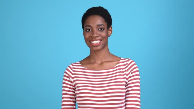 Positive guy lady toothy smiling in camera isolated blue color background