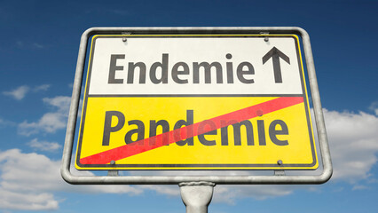 Ortsschild in Richtung Endemie - Pandemie endet