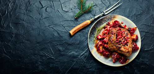 Pork meat fried with pomegranate