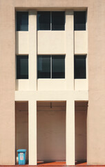 An old office building with orange coloured facade in Singapore